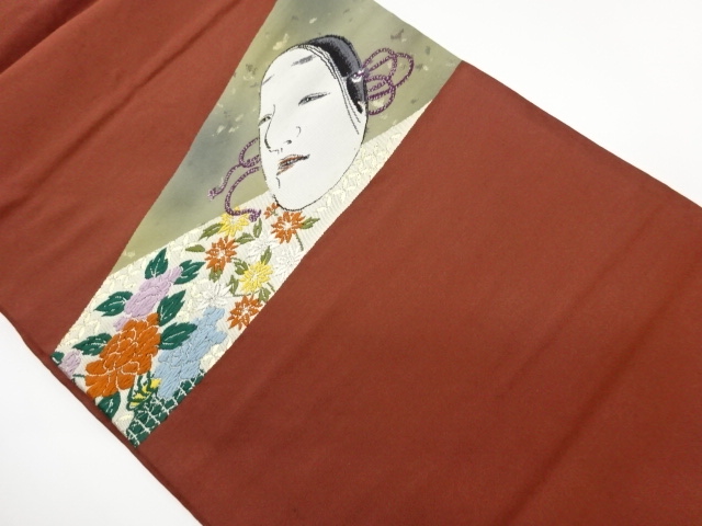 車線に草花・能面模様織出し名古屋帯